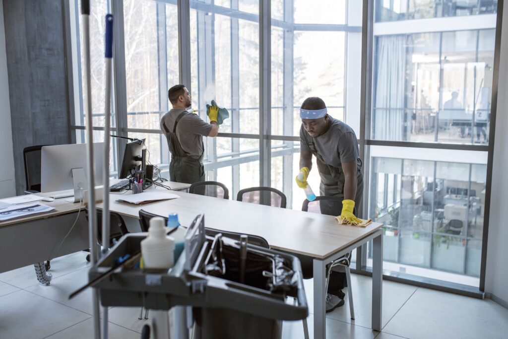 full-shot-men-cleaning-office-min